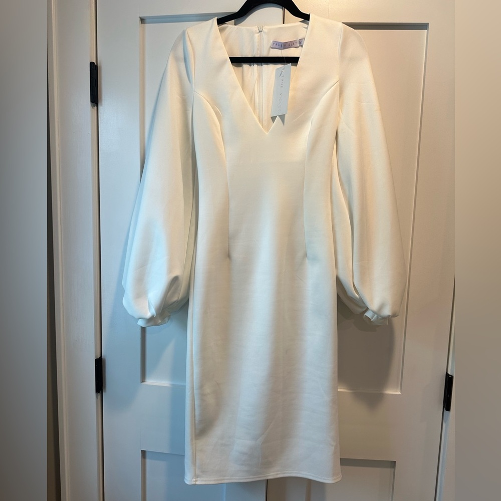 White dress with bell sleeves